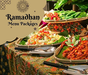A lavish Ramadan buffet spread featuring traditional Malay dishes, including roasted lamb and satay